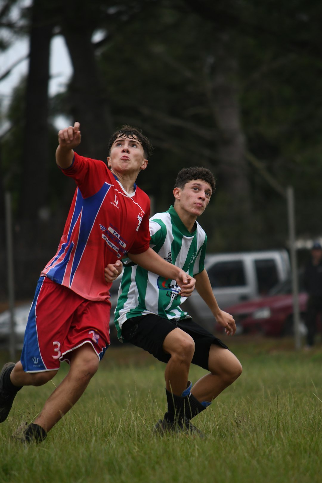 a-couple-of-young-men-playing-a-game-of-soccer-kmuzd4artju