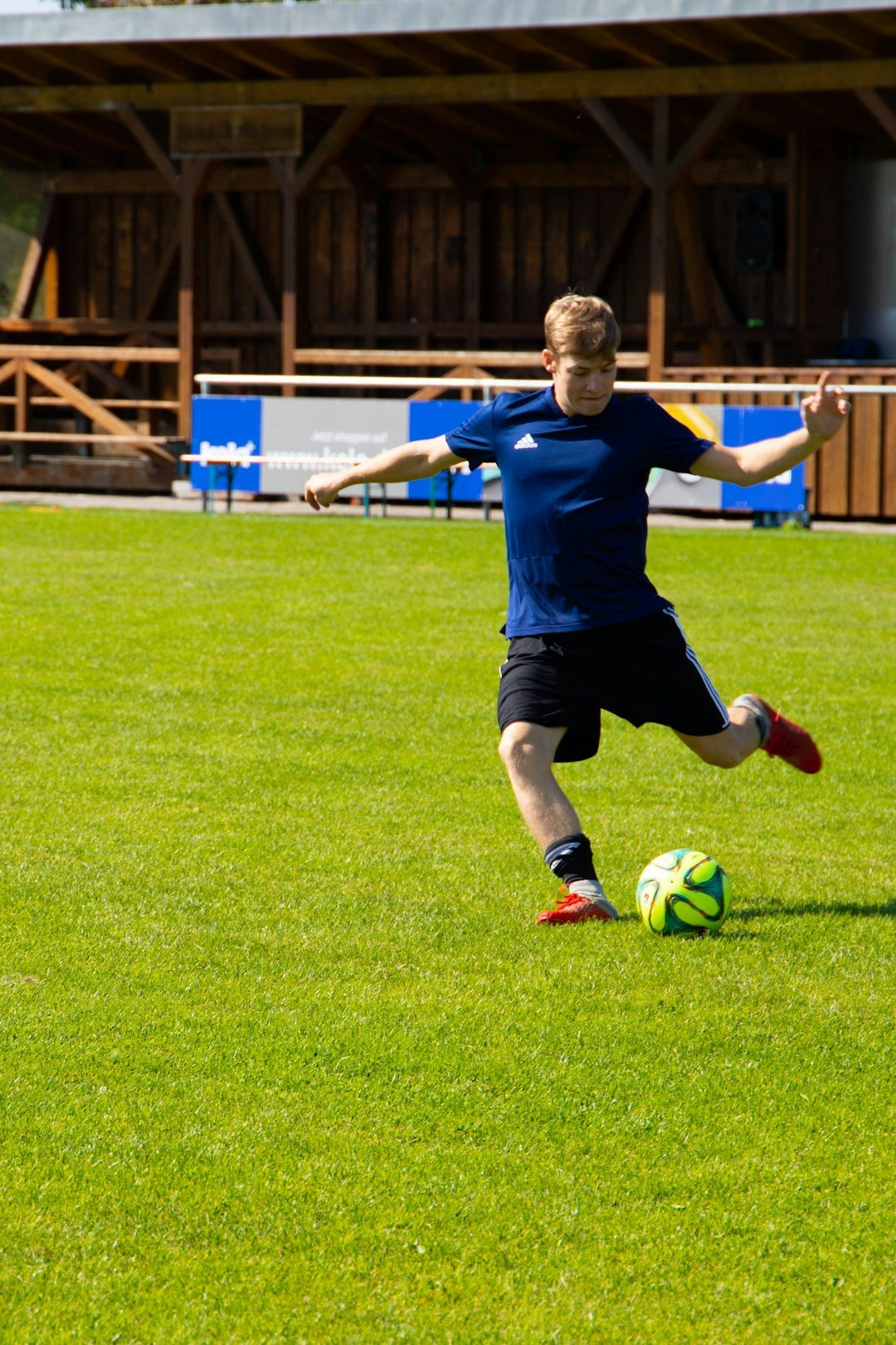 contact-img man-kicking-soccer-ball-eqotqigqadk